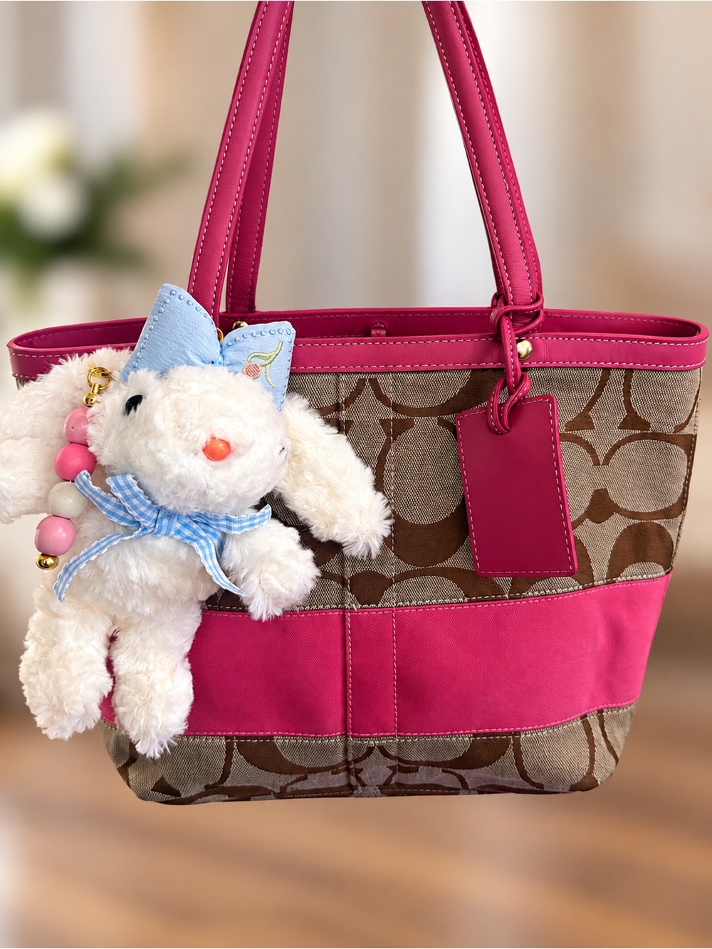 Coach Brown Signature Canvas Tote with Hot Pink Trim and Bunny Charm